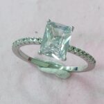 CZ RING WITH CANTER STONE