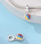 ENAMEL CAT WITH A BALL CHARM